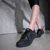 Black Diawin mesh sneakers for women, comfortable fit for active lifestyle.