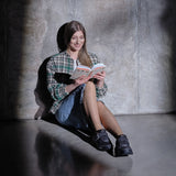 Woman reading a book in comfortable Diawin shoes for diabetic feet