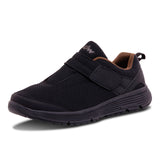 Black Diawin sneaker with wide-fit design for diabetic comfort and foot support.