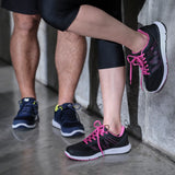 Couple wearing Diawin black sneakers, designed for wide and diabetic feet, during a workout.