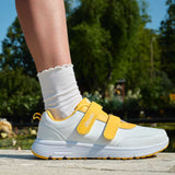 Close-up of Diawin yellow shoes for wide diabetic feet, comfortable fit.